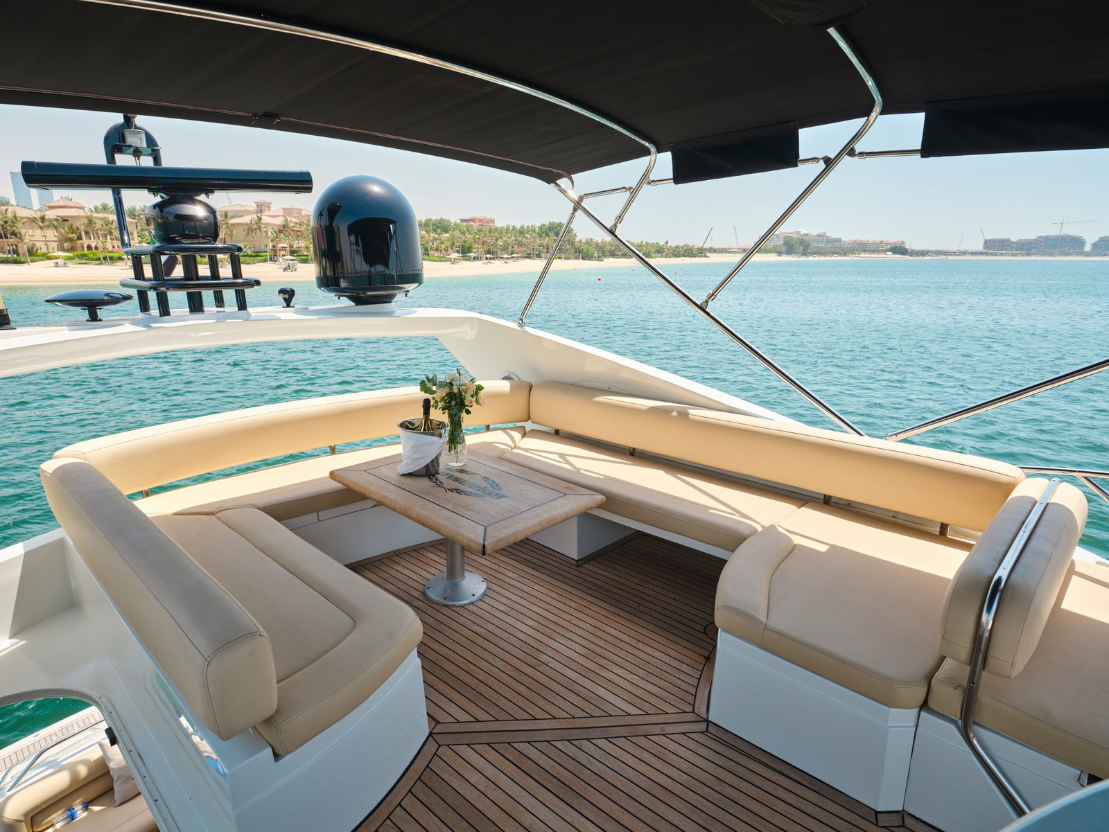Sunseeker Satoshi 70 aft lounge seating area with sea views in Abu Dhabi