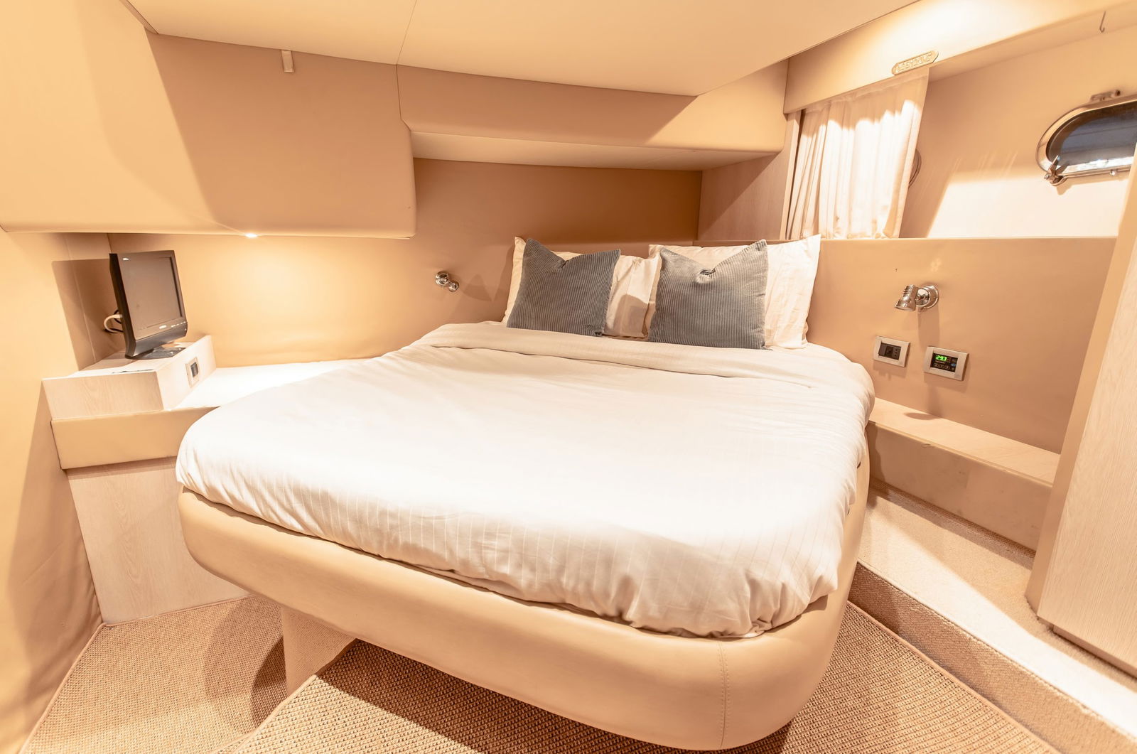 Elise 50 yacht master cabin with double bed and warm ambient lighting
