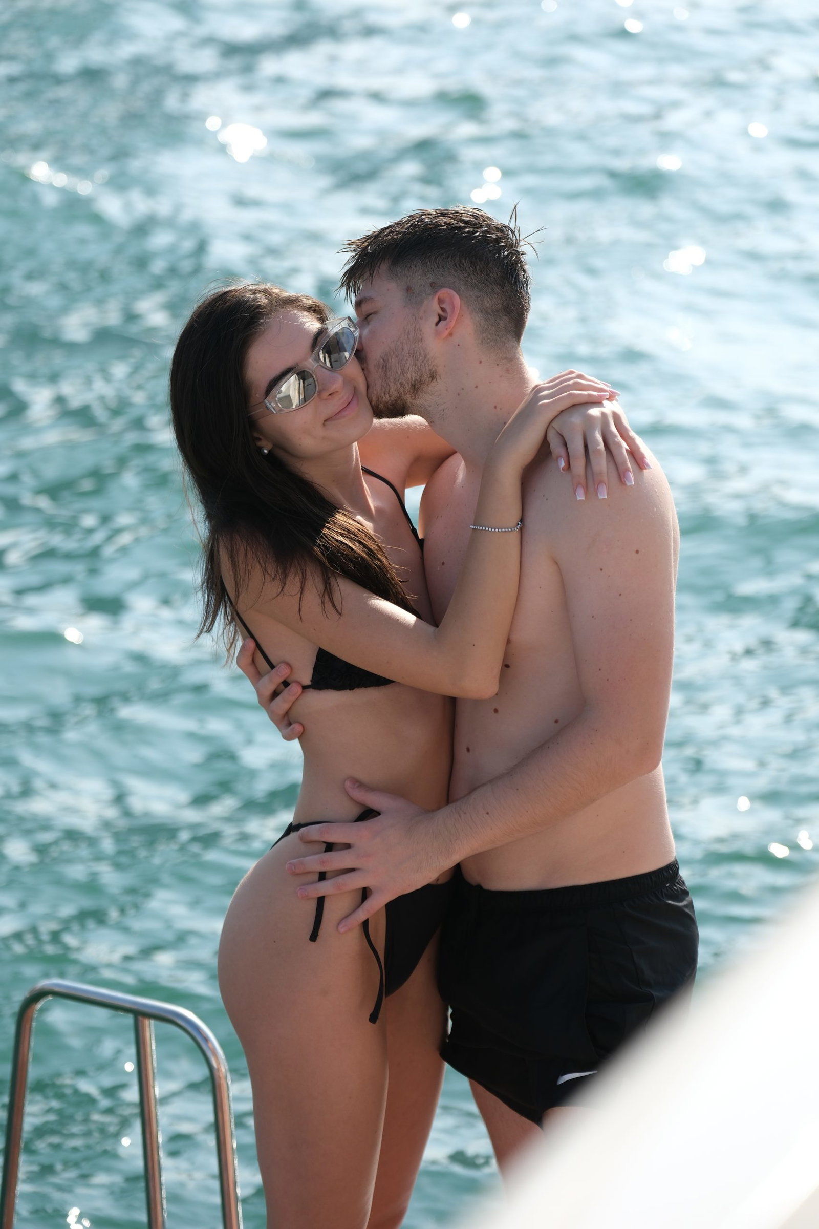 happy girlfriend during birthday celebration on a yacht