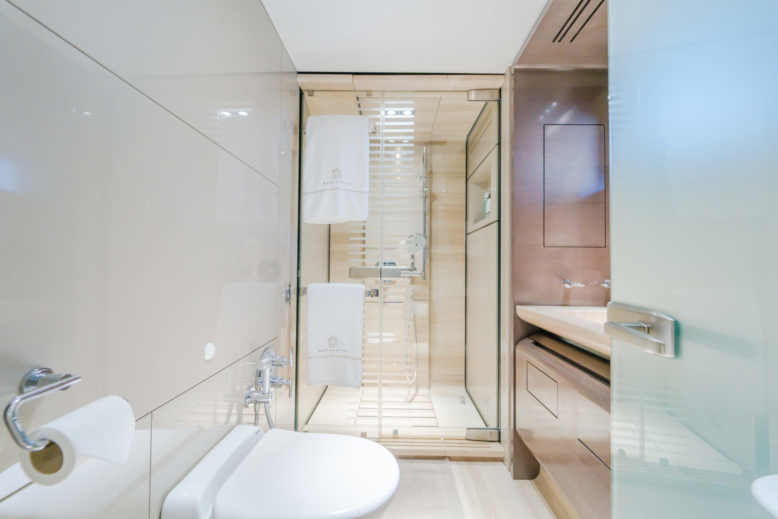 Saffuriya VIP yacht luxury bathroom with glass shower enclosure, modern vanity and elegant interior finishes
