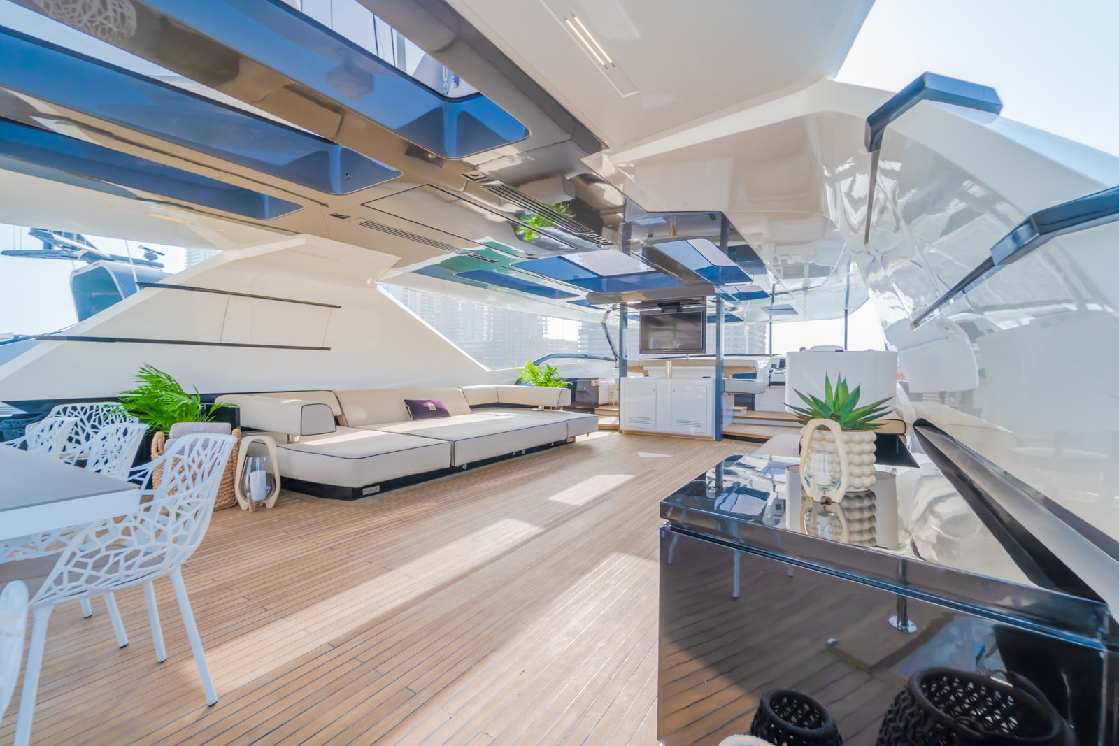 Saffuriya VIP yacht master cabin with modern lighting, wooden flooring, panoramic windows and elegant décor