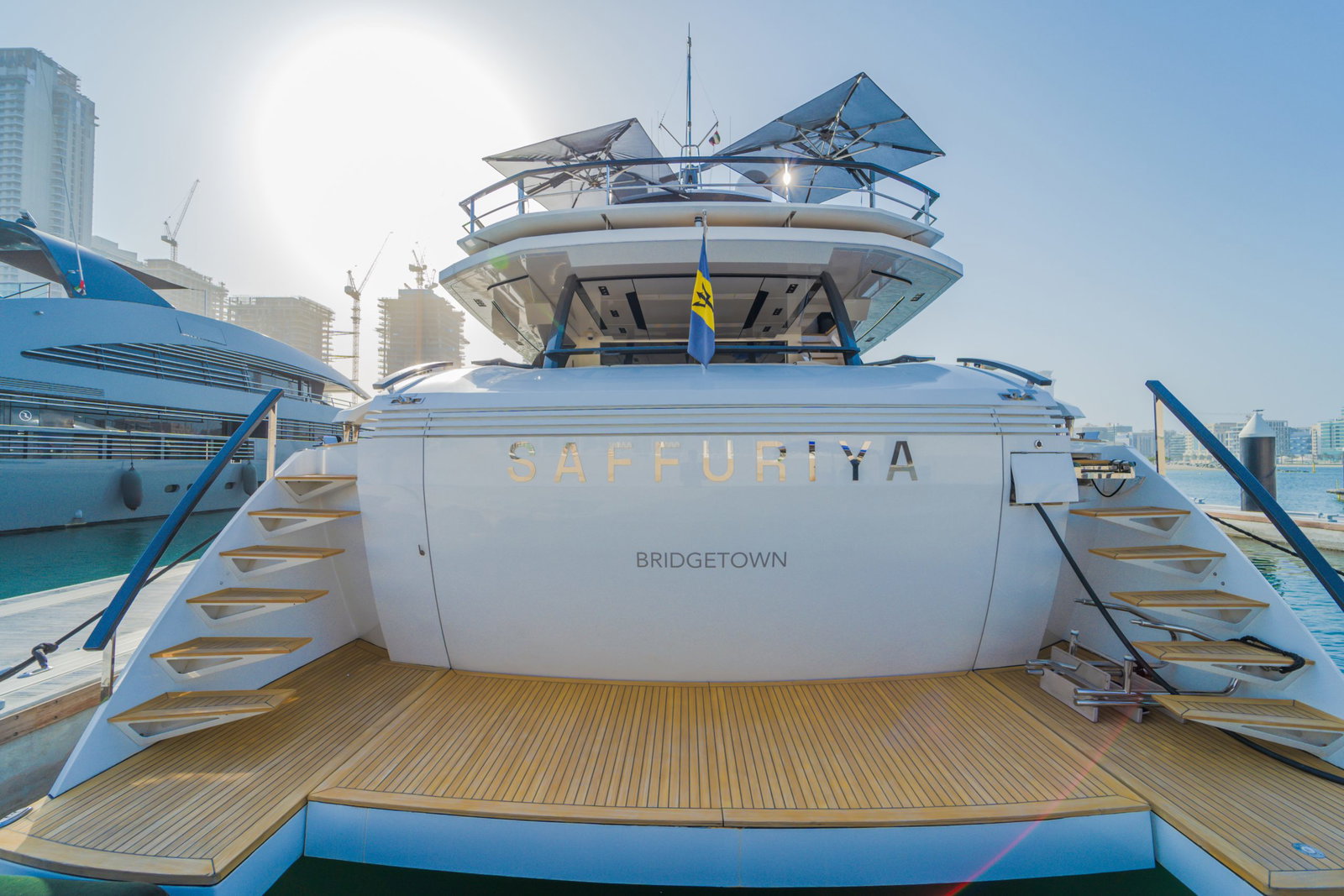 Saffuriya VIP yacht stern view showcasing teak deck, spacious aft platform and luxury superyacht design