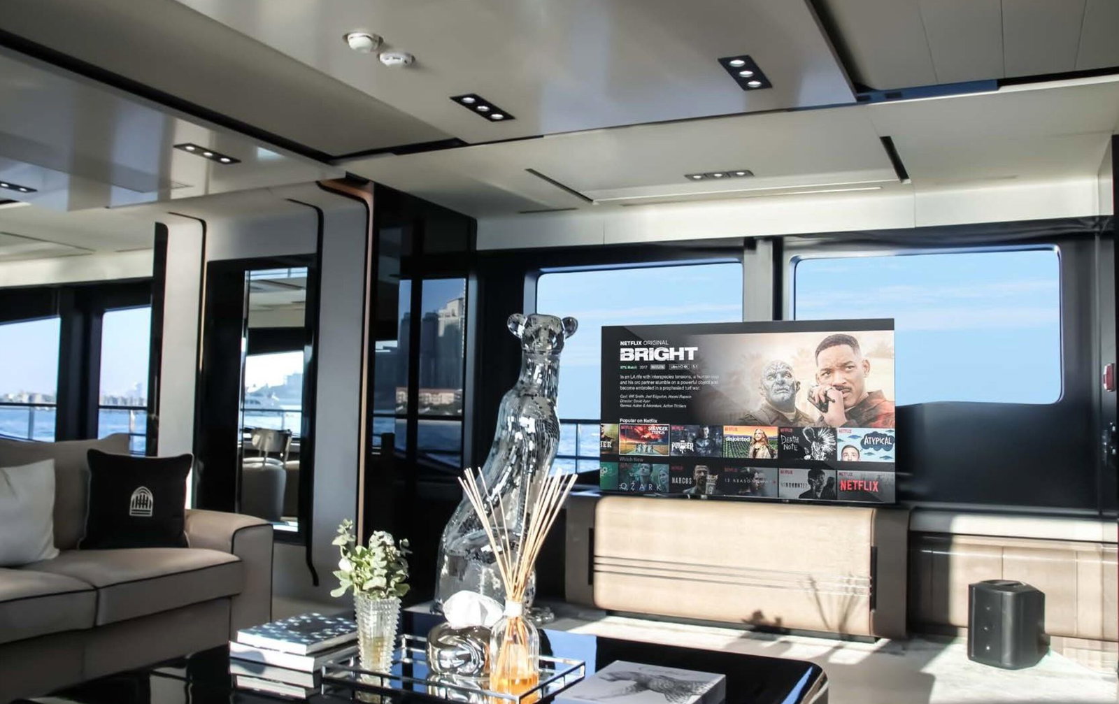 Saffuriya VIP yacht main salon with luxury seating, modern entertainment system and panoramic sea views