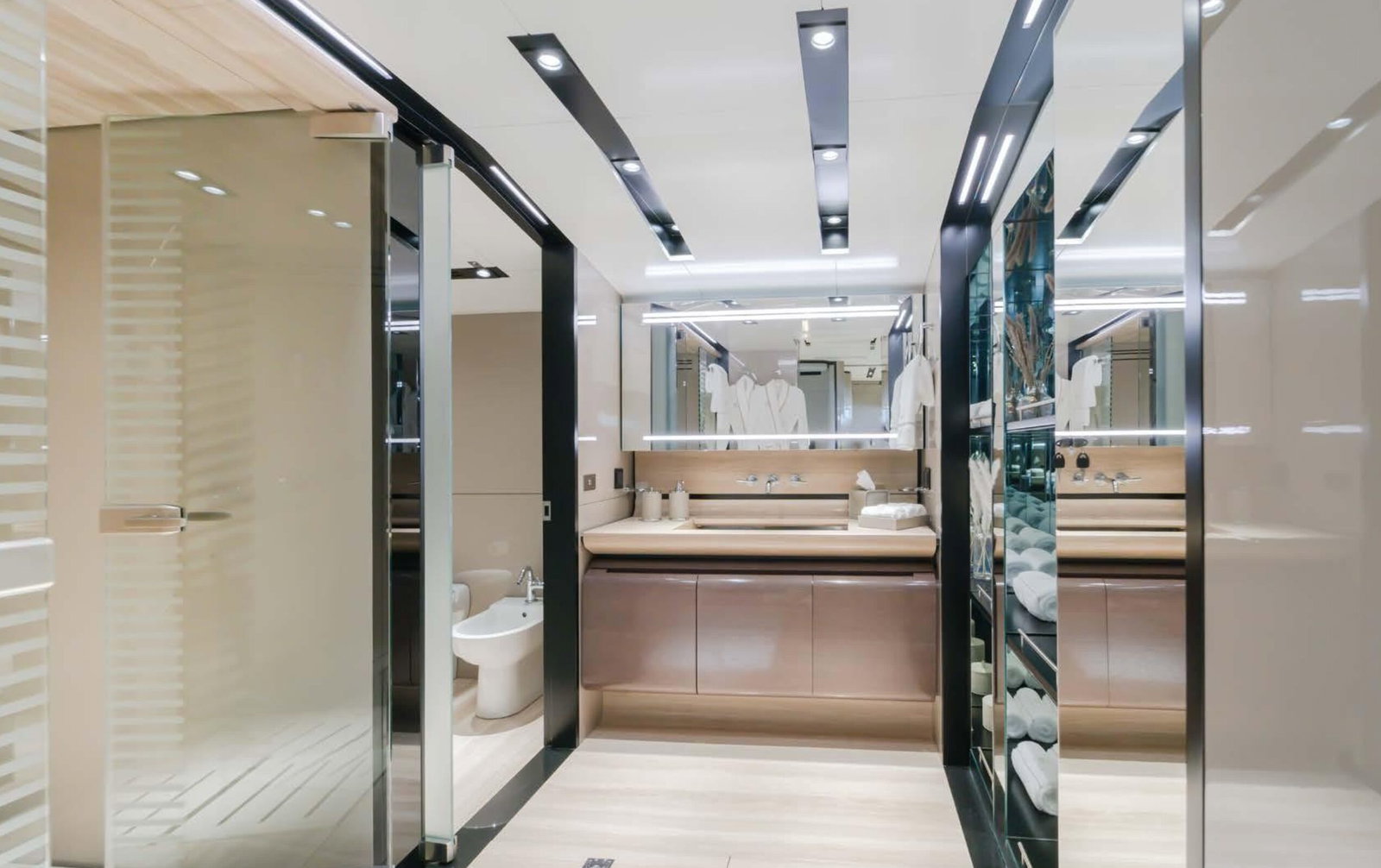 Saffuriya VIP yacht dressing area with mirrored wardrobes, vanity space and modern ceiling lighting