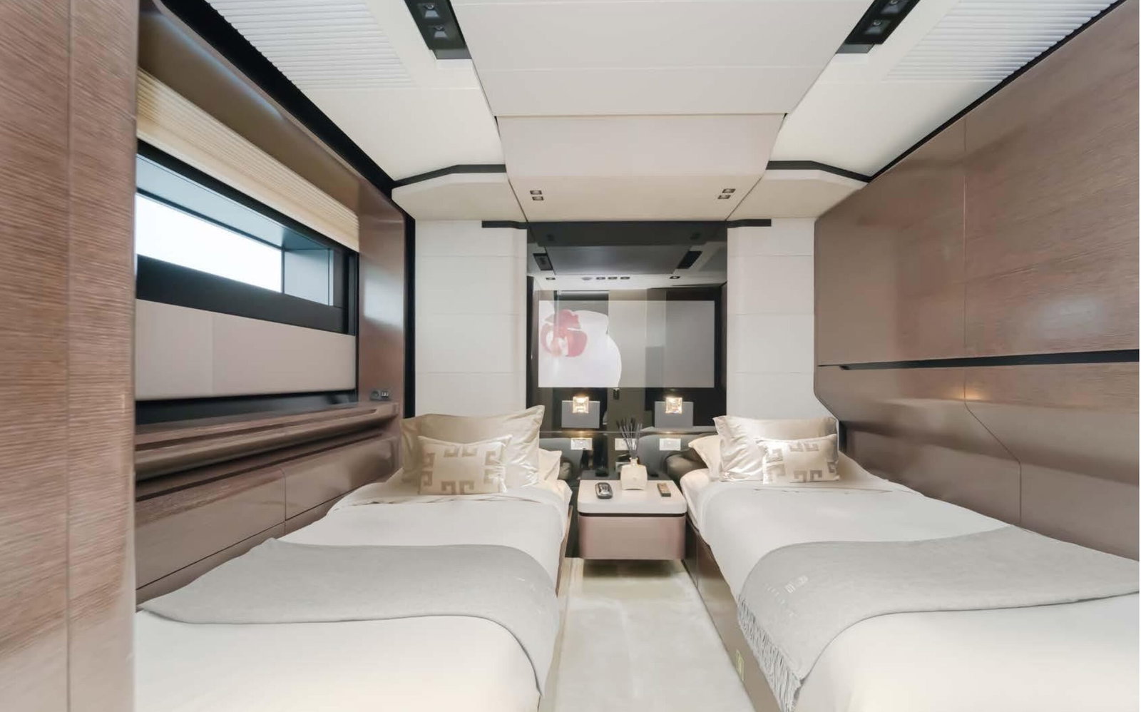 Saffuriya VIP yacht private lounge cabin with plush sofas, modern décor and panoramic window views