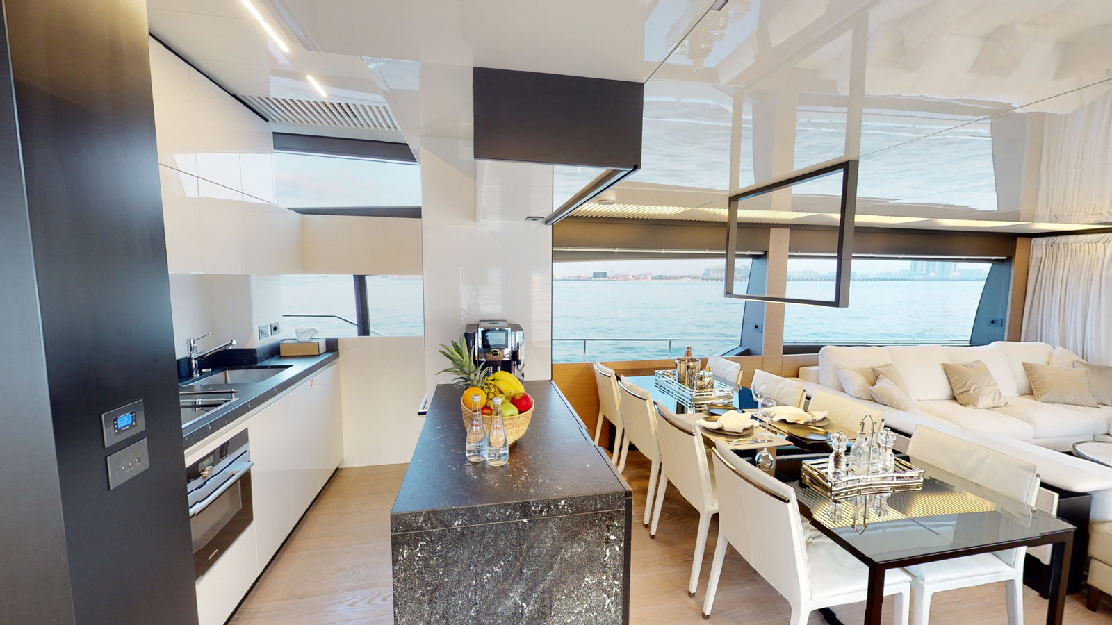 Ferretti 780 yacht galley kitchen and dining area interior