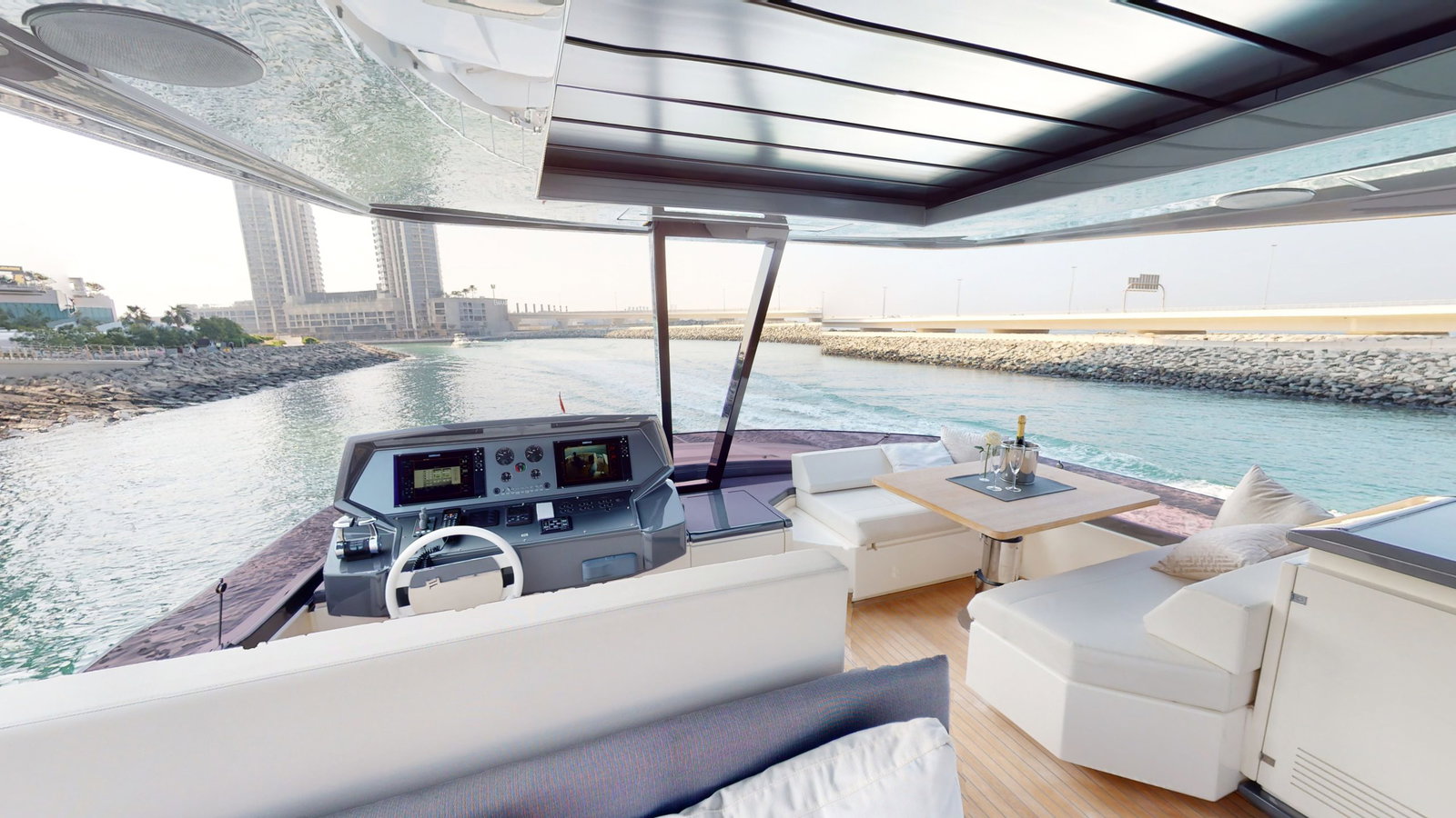 Ferretti 780 flybridge helm station with navigation controls