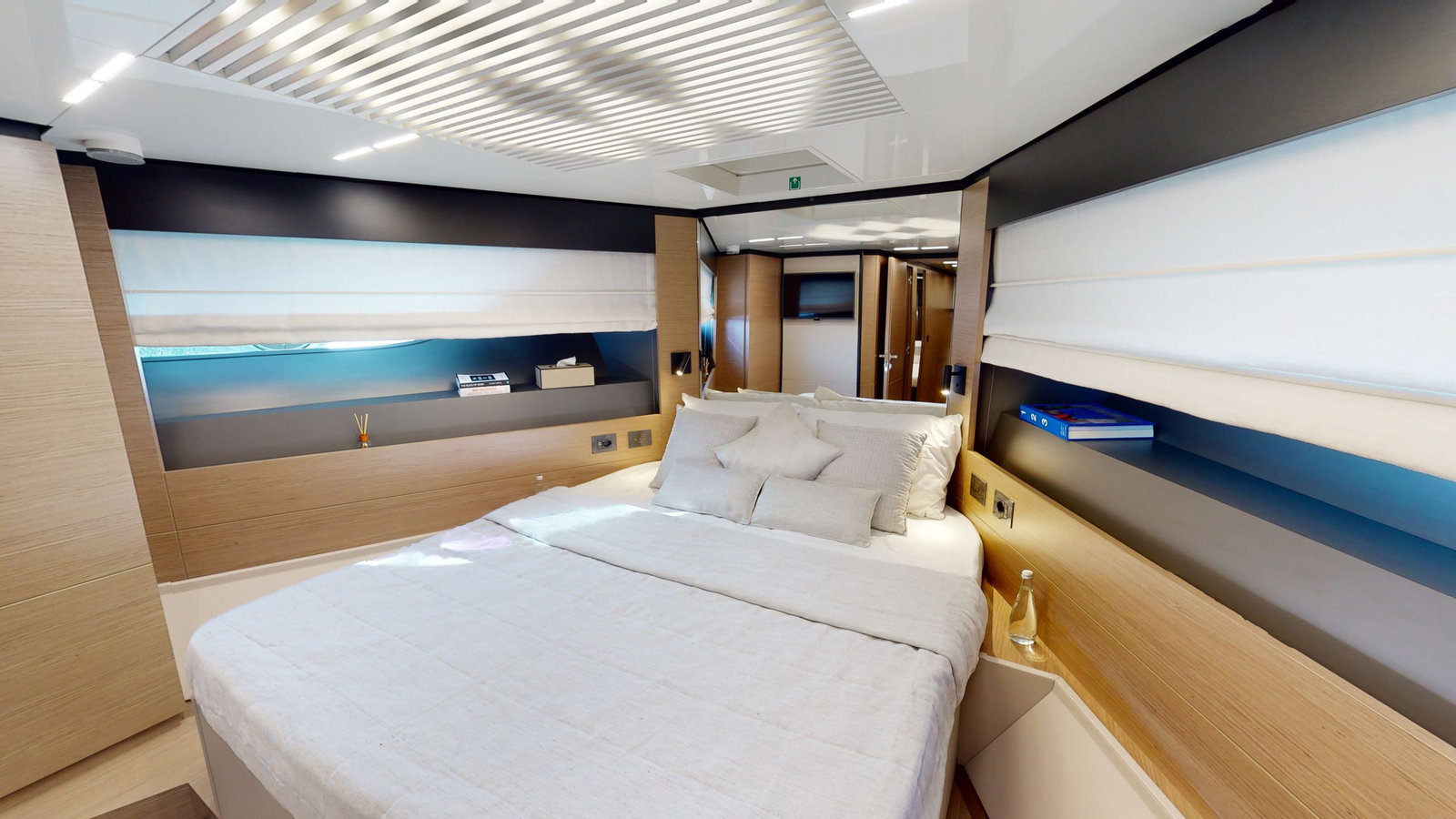 Ferretti 780 VIP cabin with double bed and modern interior design