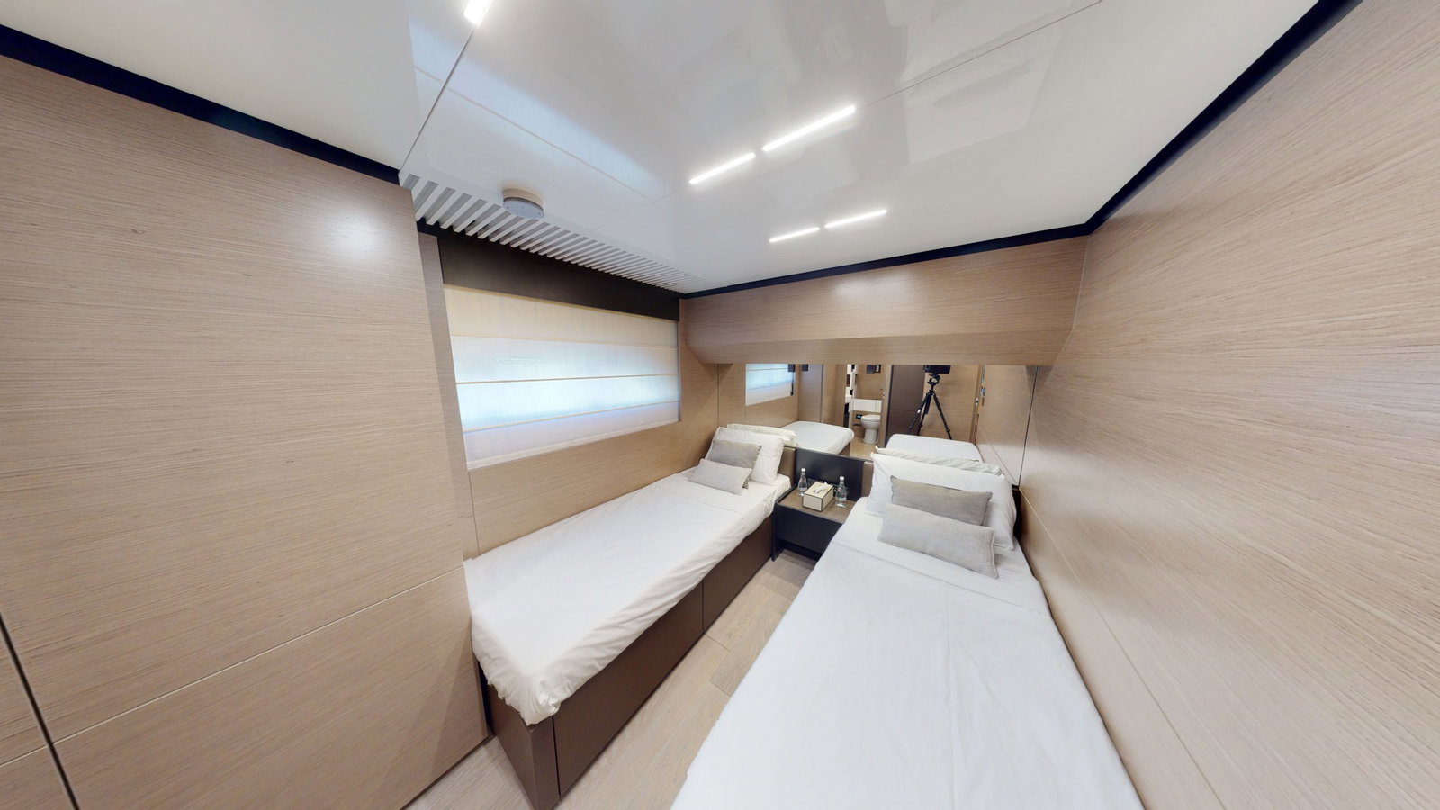 Ferretti 780 guest cabin seating and sleeping area