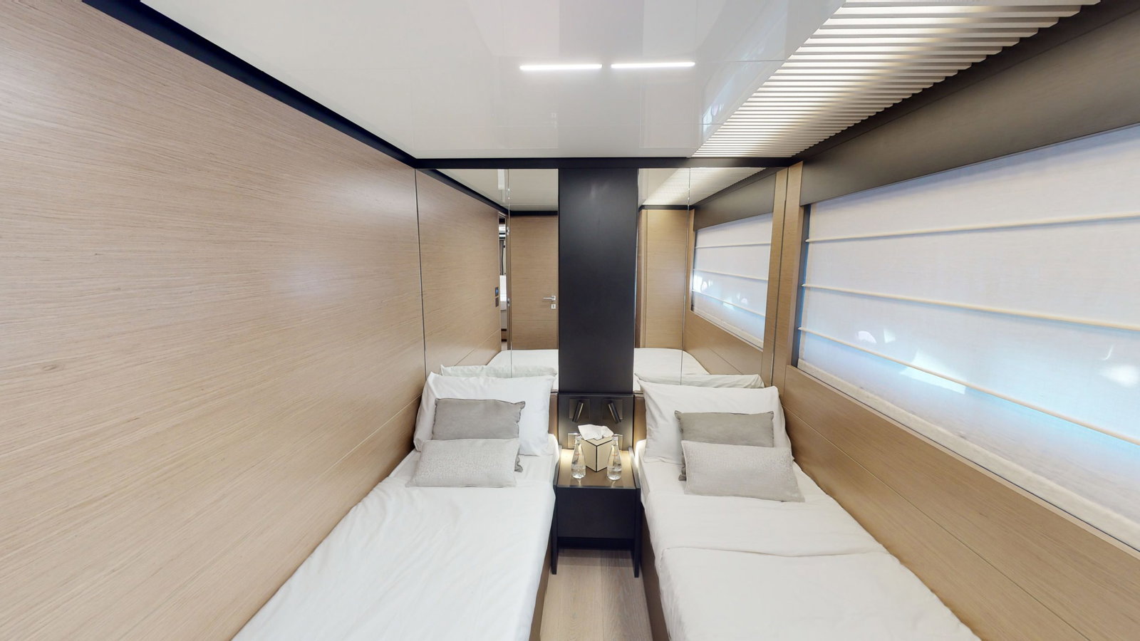 Ferretti 780 twin guest cabin with modern beige interior