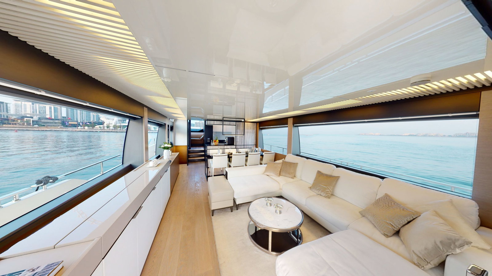Ferretti 780 main salon lounge with panoramic sea views
