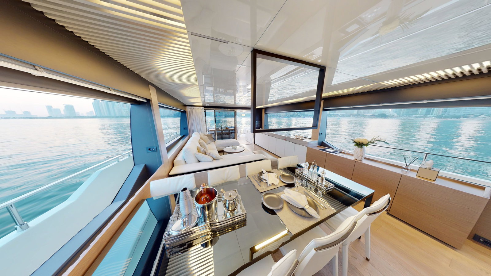 Ferretti 780 luxury yacht dining area with floor to ceiling windows