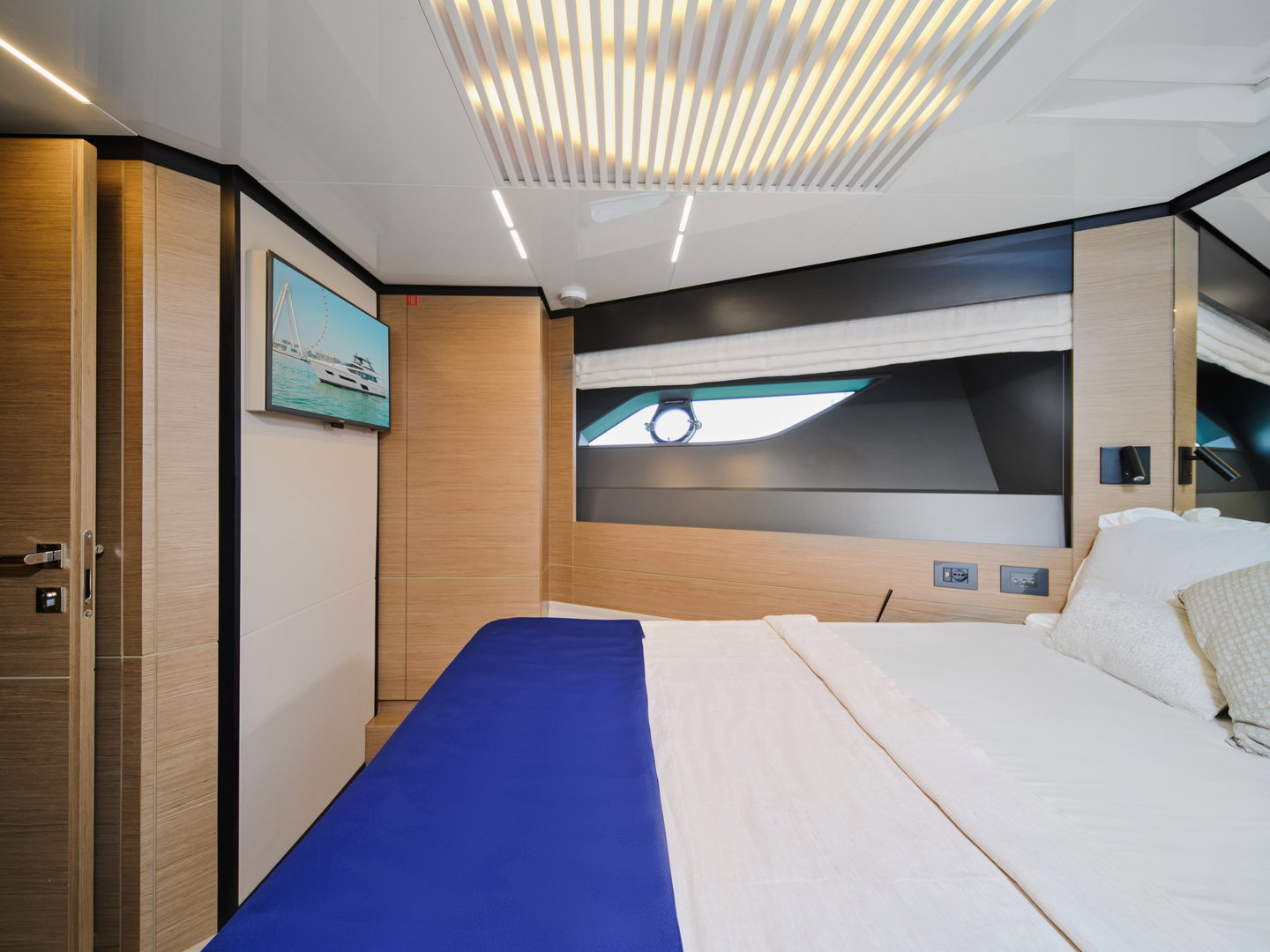 Modern interior cabin on Ferretti 780 yacht with double bed