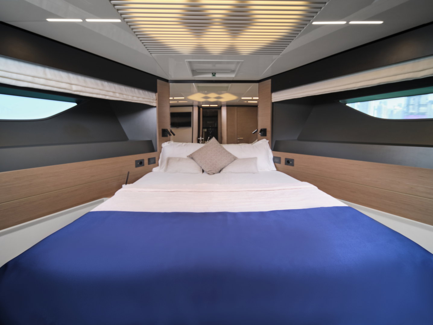 Master bedroom on Ferretti 780 yacht with modern lighting design
