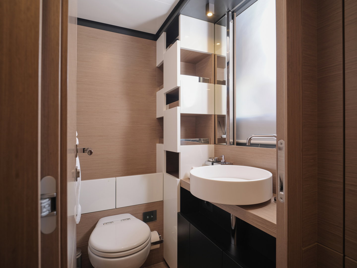 En-suite bathroom on Ferretti 780 yacht with modern fixtures