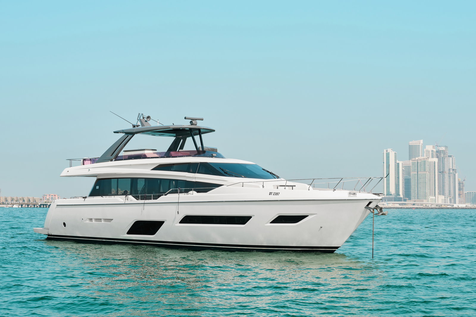 Ferretti 780 luxury yacht cruising on calm blue waters
