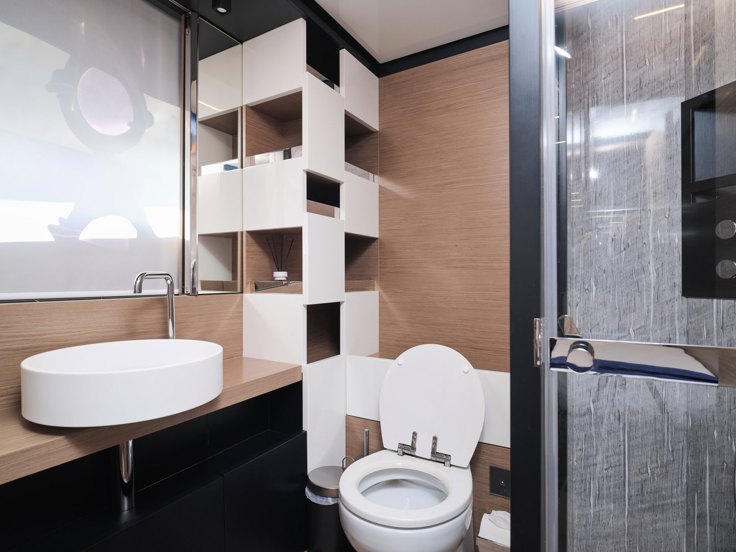 Modern bathroom on Ferretti 780 yacht with shower and vanity unit