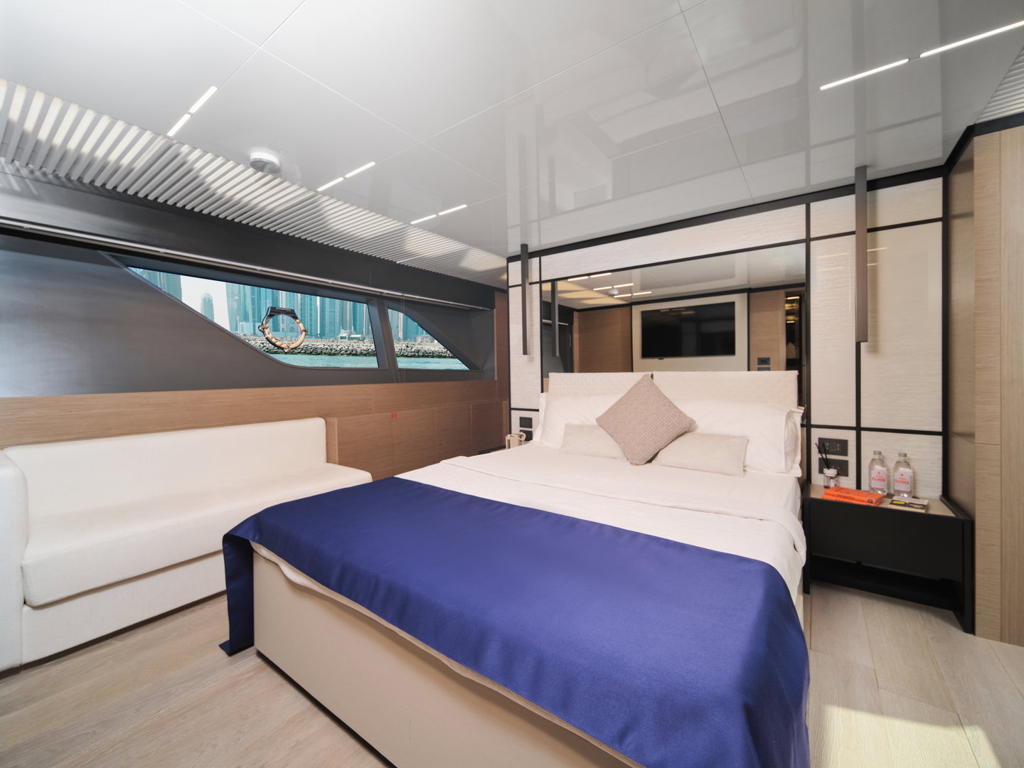 Luxury bedroom on Ferretti 780 yacht with panoramic window