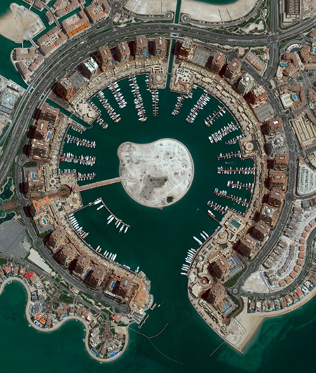 Luxury yachts docked at The Pearl Marina Doha aerial view